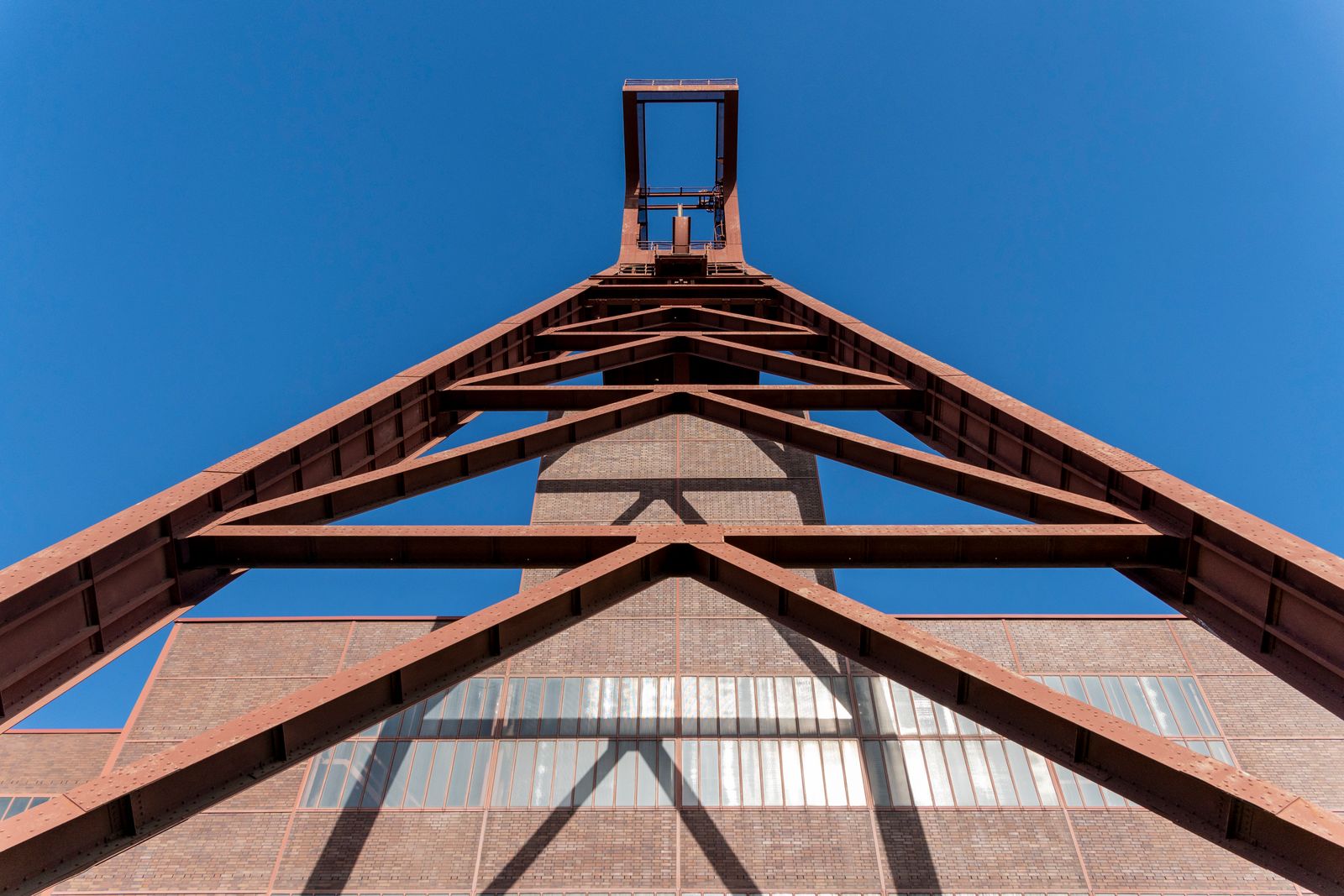 Structural steel framework fabricated and erected against a clear sky